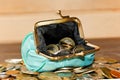 Turquoise Purse for coins. Color trend. Open wallet with coins. The concept of poverty . Crowdfunding Royalty Free Stock Photo