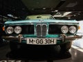 Turquoise BMW exhibit at the BMW Museum, Munich. Vintage BMW car with chromed parts.