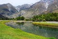 Turquoise river and mountains