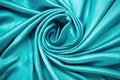 turquoise satin fabric twisted like a rope