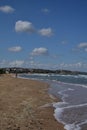 Turquoise sea golden sand, blue sea and clouds like wool white hanging in blue sky, dream beach, azure coast, empty beach, end of Royalty Free Stock Photo