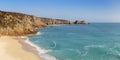 Turquoise sea at Porthcurno Beach in Cornwall, South England Royalty Free Stock Photo