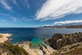 Turquoise sea and rocky coastline at Revellata in Corsica Royalty Free Stock Photo