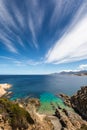 Turquoise sea and rocky coastline at Revellata in Corsica Royalty Free Stock Photo