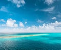 Turquoise sea water perfect blue sky white clouds Royalty Free Stock Photo
