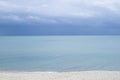 Turquoise sea water surface with horizon and blue sky Royalty Free Stock Photo