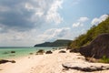 Turquoise sea, white sand and stones