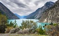 Turquoise Seton Lake between mountain ranges.