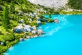Turquoise Sorapis Lake in Cortina d'Ampezzo, with Dolomite Moun
