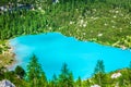 Turquoise Sorapis Lake with Pine Trees and Dolomite Mountains in