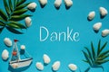 Turquoise Summer Flat Lay, Boat And Shells, Text Danke Means Thank You