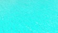 Turquoise surface with white highlights. Beautiful turquoise background. Slippery wavy surface. Royalty Free Stock Photo