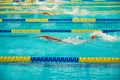 Turquoise swimming pool lanes Royalty Free Stock Photo