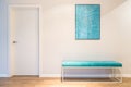 Turquoise upholstered bench seat Royalty Free Stock Photo