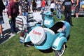 Turquoise Vespa Motorscooter With Side Car