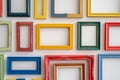 Colorful Empty Picture Frames on Wall in Living Space Royalty Free Stock Photo