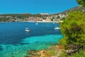 Turquoise water of Adriatic sea on Hvar island and Hvar old town in Dalmatia region, Croatia