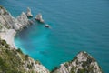 Turquoise water in the famous beach of Two sisters (spiaggia delle due sorelle) in the park of Monte Conero