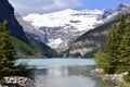 Turquoise water at Lake Louise flowing through narrow stream in Banff National Park Royalty Free Stock Photo