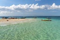 Turquoise water in Prison Island. Beach and wooden boat in Zanzibar, Tanzania, Africa