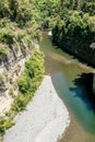 The Rangitikei river flowing through the towering cliffs and rock walls in the canyons and gorges in the Manawatu Region of N Z