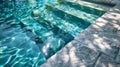 Turquoise water reflecting sunlight in outdoor pool Royalty Free Stock Photo