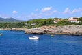 Turquoise water and rocks at Cala Marcal beach and Cala d`Or city, Palma Mallorca Island, Spain Royalty Free Stock Photo