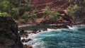 Kaihalulu Red Sand Beach and Cove with Turquoise Water