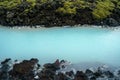 Turquoise water sulfur spring and lava field, Iceland