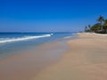 Turquoise water and white sand in beautiful Colva beach, clean water Arabian sea beach, goa beach, tropical beach. Royalty Free Stock Photo