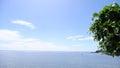 Turquoise water, white waves, blue sky, Green tree, White sand, Beautiful beach,and beautiful Island, Sayang heulang Garut, Royalty Free Stock Photo