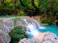 Turquoise waterfall in France