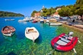 Turquoise waterfront and colorful boats in town of Cavtat