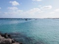 Turquoise waters of Atlantic Ocean landscape and rocks at african town of Santa Maria on Sal island in Cape Verde Royalty Free Stock Photo