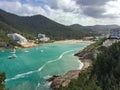 Turquoise waters of Cala Llonga bay, Mediterranean sea, Ibiza Is Royalty Free Stock Photo