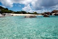 Turquoise waters, granite boulders and fine white sand