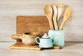 Turquoise and wooden vintage crockery, tableware, dishware utensils and stuff on wooden table-top. Kitchen still life as backgroun Royalty Free Stock Photo