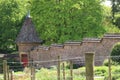 A turret in the corner of an kitchen garden of a English stately house near Tiverton in Devon, England