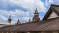 Turrets of the Rostov Kremlin against the background of a cloudy sky.