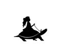 Child silhouete riding a turtle