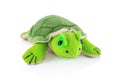 Turtle plushie doll isolated on white background with shadow reflection. Plush stuffed puppet on white backdrop. Fluffy turtle toy Royalty Free Stock Photo