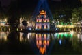 Turtle Tower on Hoan Kiem Lake in the spotlight. The historic center of Hanoi