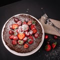 Tuscan chocolate cake with strawberries and cherries Royalty Free Stock Photo