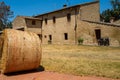 A Tuscan farmhouse seen on a clear day in Italy