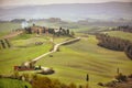 Tuscan hill with row of cypress trees and farmhouse. Tuscan landscape. Italy Royalty Free Stock Photo