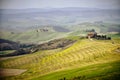 Tuscan hill with row of cypress trees and farmhouses. Tuscan landscape. Italy Royalty Free Stock Photo
