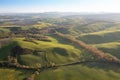 Tuscan hills. Cypresses. Minimalist landscape with green fields in Tuscany. Val D`orcia in the province of Siena, Italy. Royalty Free Stock Photo