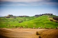 Tuscan hill with row of cypress trees and farmhouse. Tuscan landscape. Italy Royalty Free Stock Photo