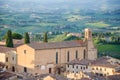 A Tuscan landscape with Sant\'Agostino church in San Gimignano, Italy Royalty Free Stock Photo