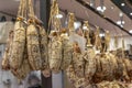 Tuscan salami hanging in a butcher shop in Florence